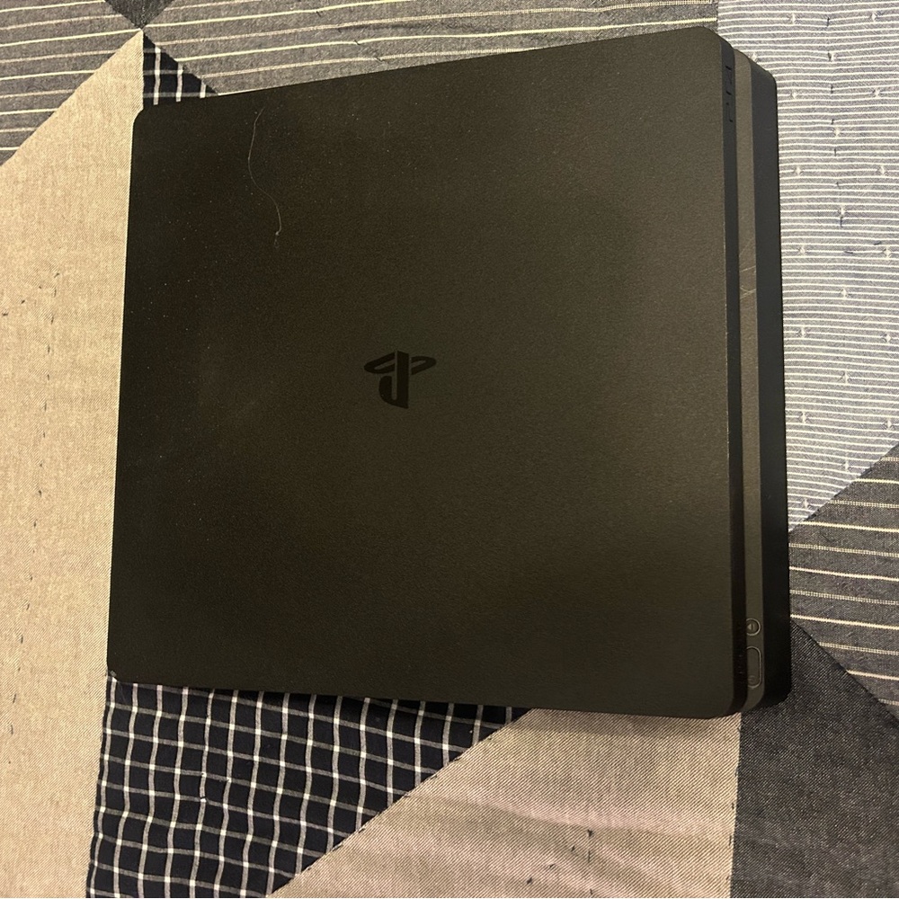PS4 console with 3 controllers. Great condition!
